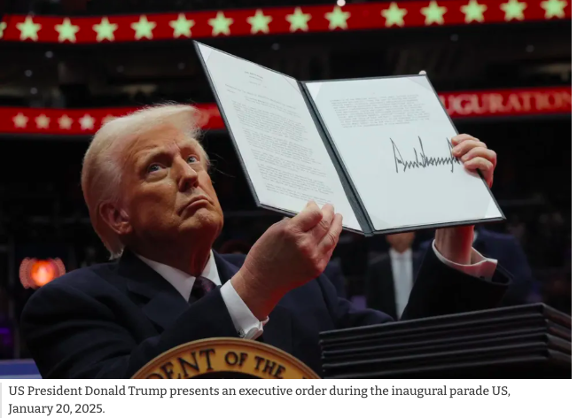 US President Donald Trump presents an executive order during the inaugural parade US, January 20, 2025.