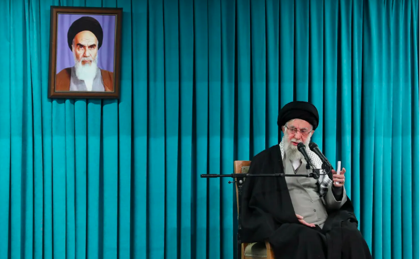 Iranian Supreme Leader Ayatollah Ali Khamenei speaks below portrait of the Ayatollah Khomeini, Tehran, Iran, March 8, 2025. Office of the Iranian Supreme Leader via AP