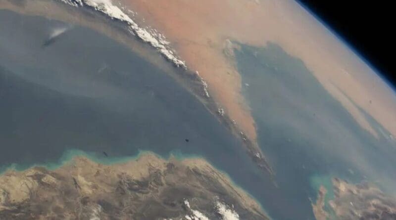 A satellite photo shows the strategically important shipping route of the Strait of Hormuz. Photo Credit: NASA
